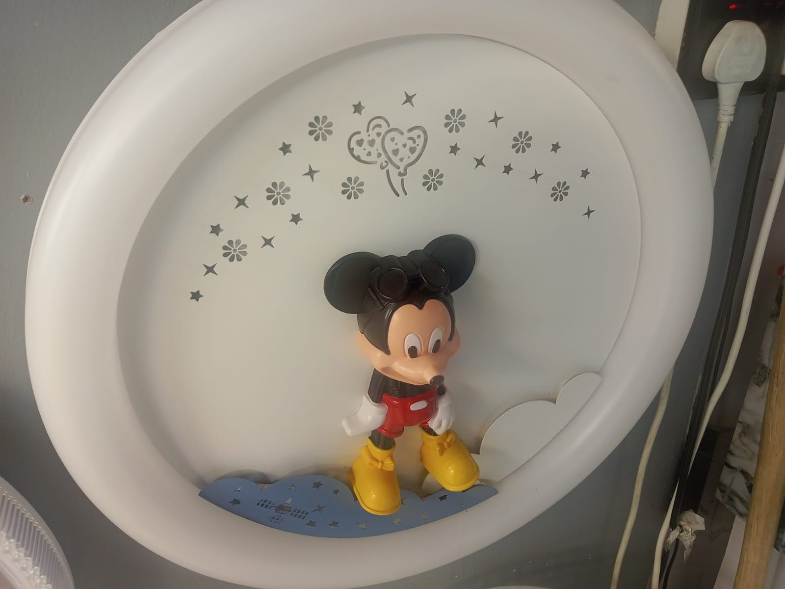 Ceiling light with doll design